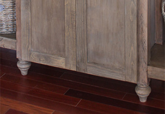 Image of wood stained custom cabinet with bun feet