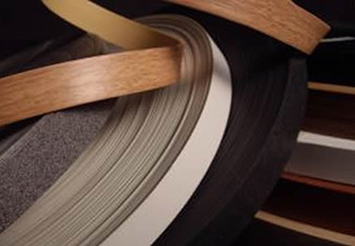 Image of edgebanding rolls in various wood & solid color finishes